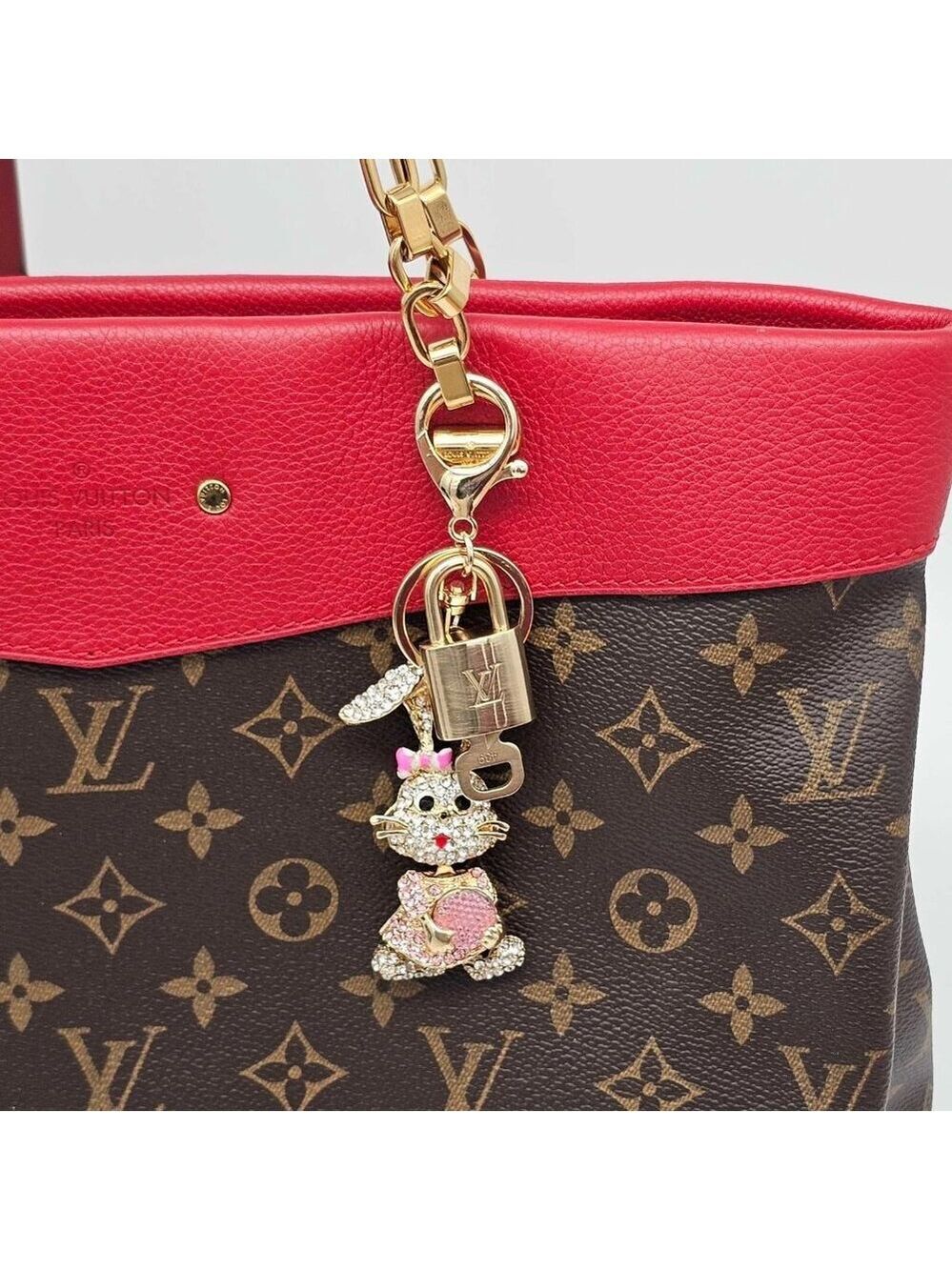 Authentic Louis Vuitton Lock & Key with unbranded Bunny Bagcharm, Keychains